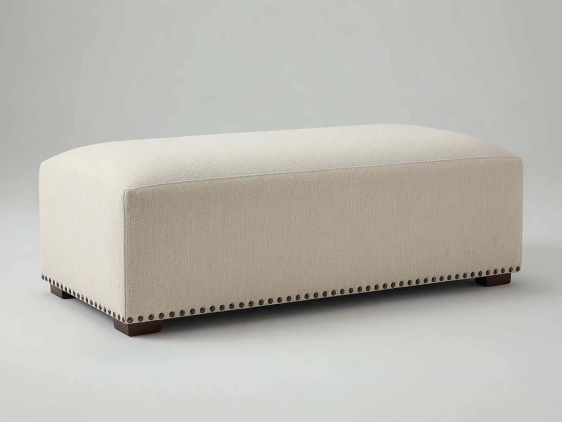 Cream bench ottoman with nailhead trim